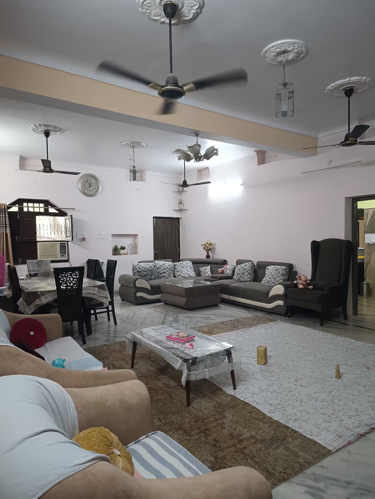 Living room with polished marble flooring and sofa set by MakeHouse in Darbhanga, Bihar